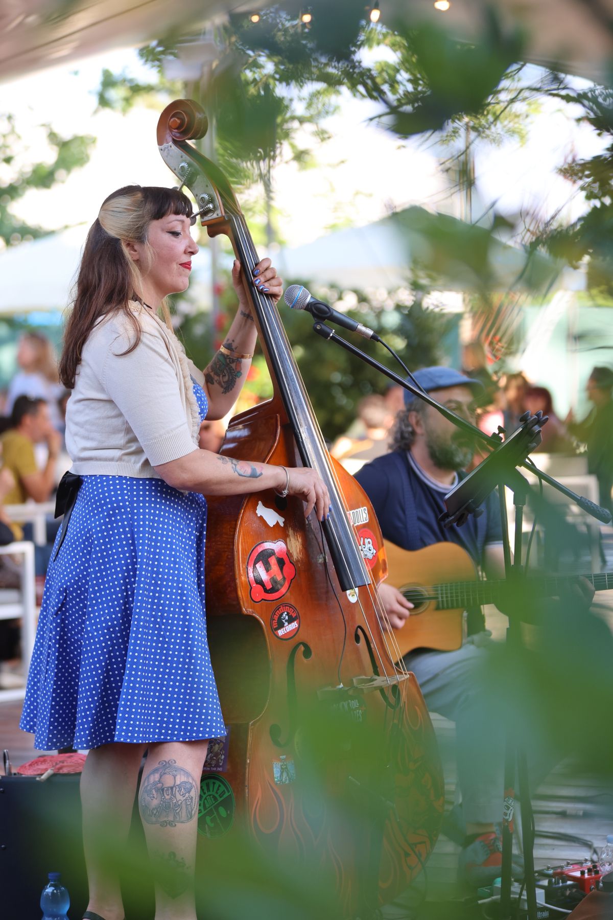 A musician performing live outdoors