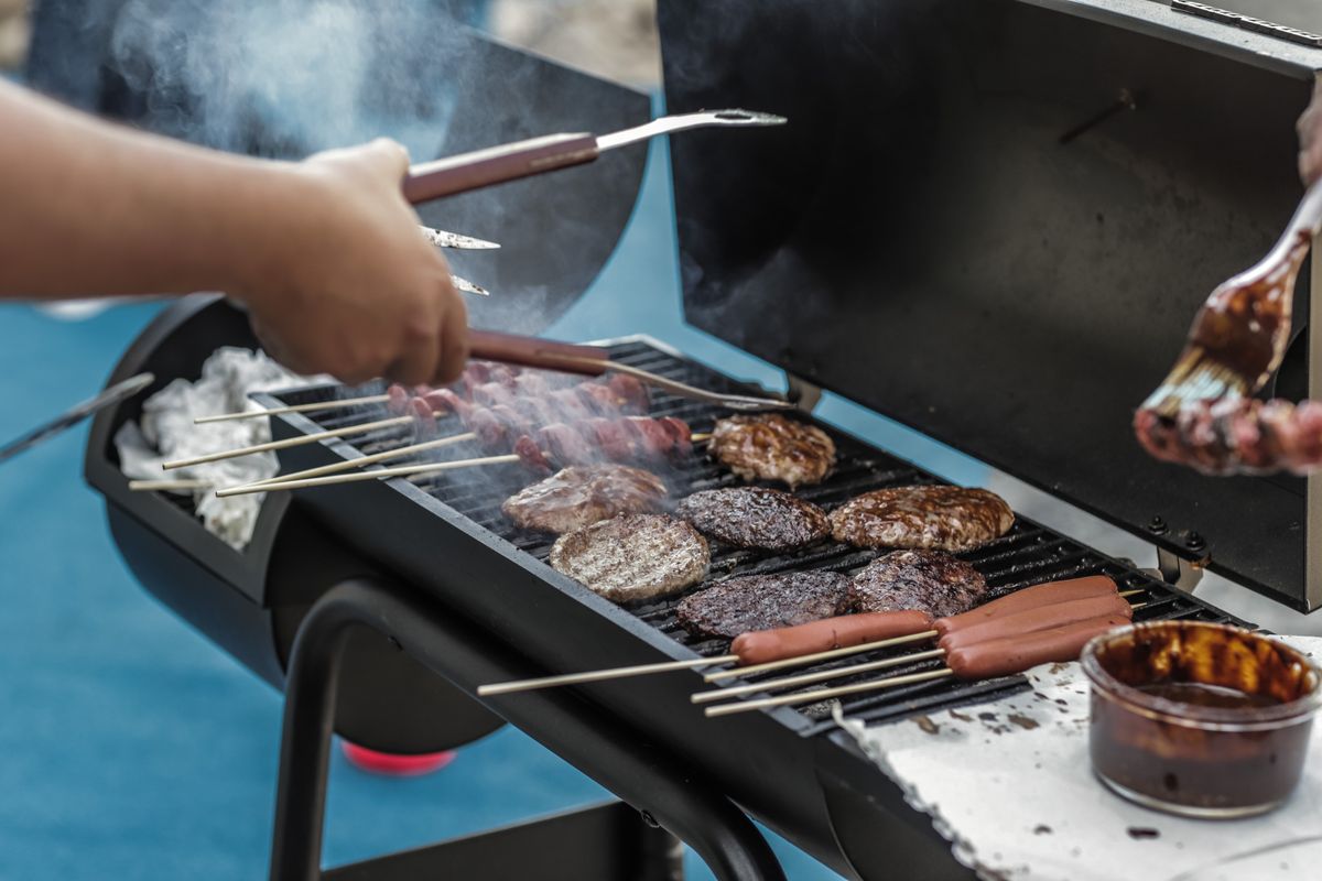 Hamburgers and hot dogs on the grill